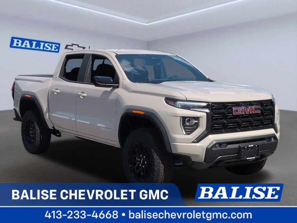 2026 GMC Canyon Elevation in Coastal Dune — front three-quarter view