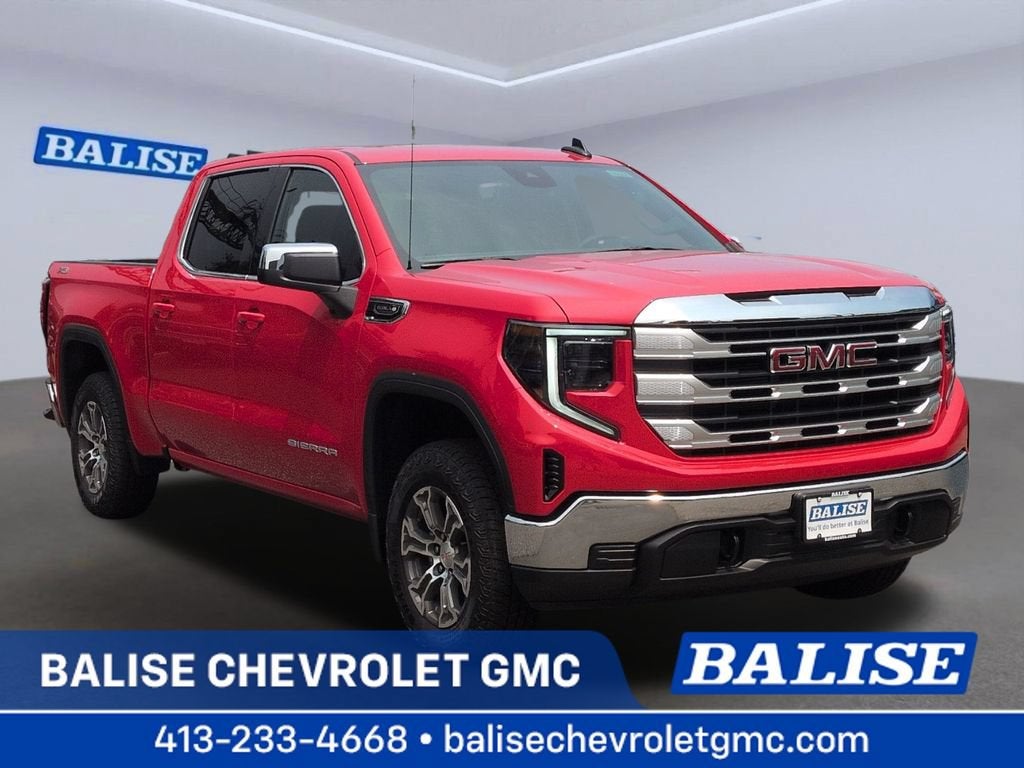 2026 GMC Sierra 1500 SLE in Cardinal Red — front three-quarter view