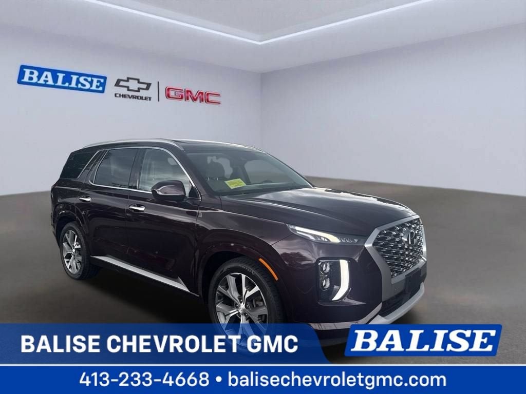 2022 Hyundai Palisade Limited in Red — front three-quarter view